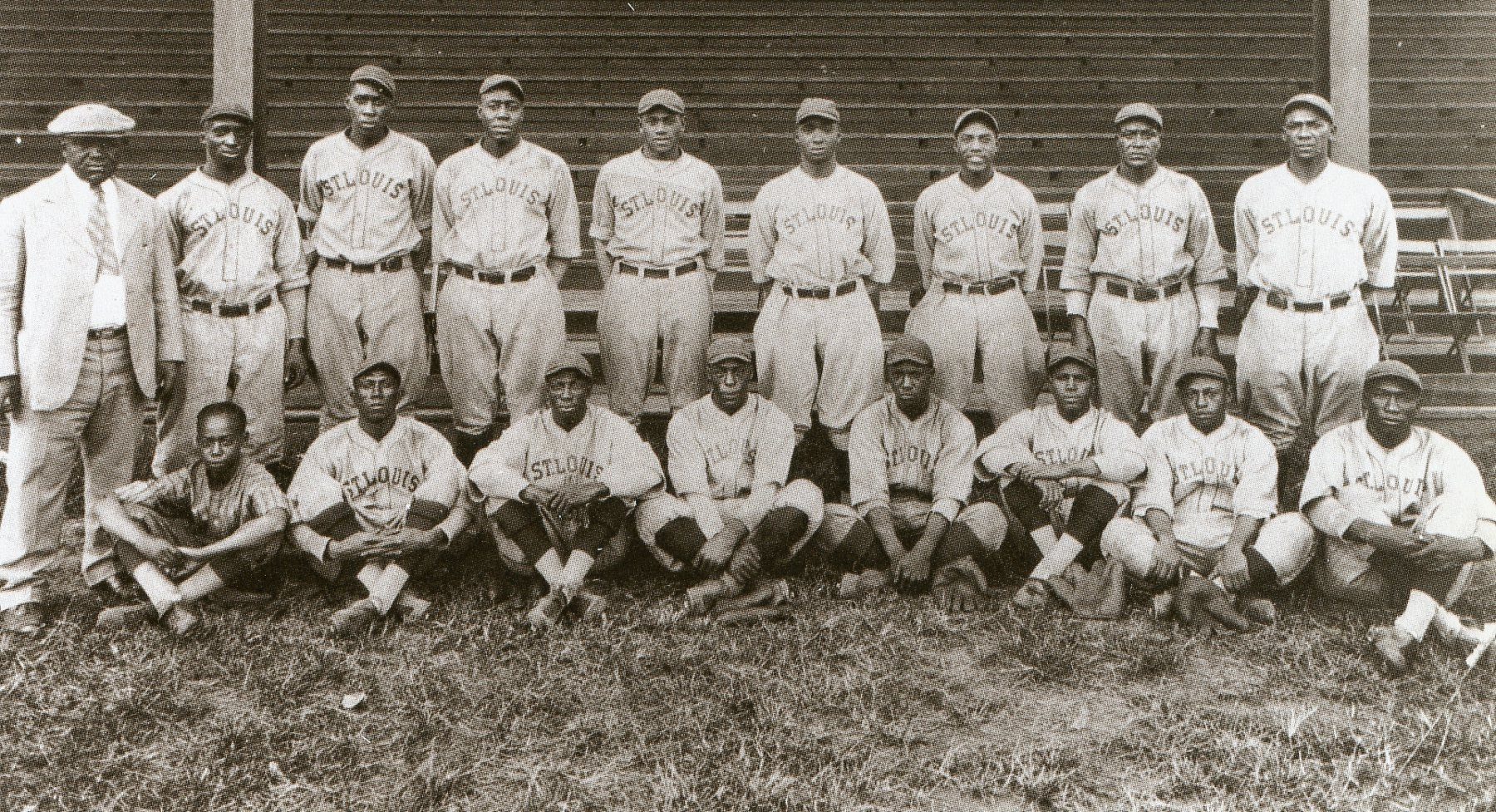 St. Louis Stars, 1927. Mule Suttles is fourth from left, front row and Cool Papa Bell is sitting at his feet.