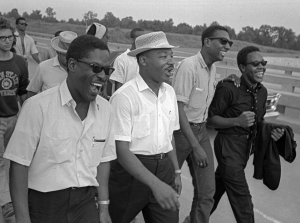 Bernard Lee, Martin Luther King, Stokely Carmiachel & Willie Ricks Enjoy a Moment of Levity (Stanford University)