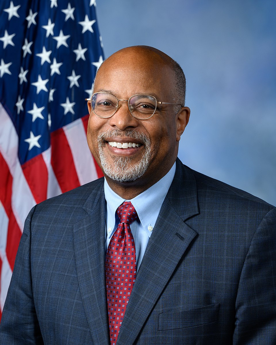 Rep. Glenn Ivey posing with American flag