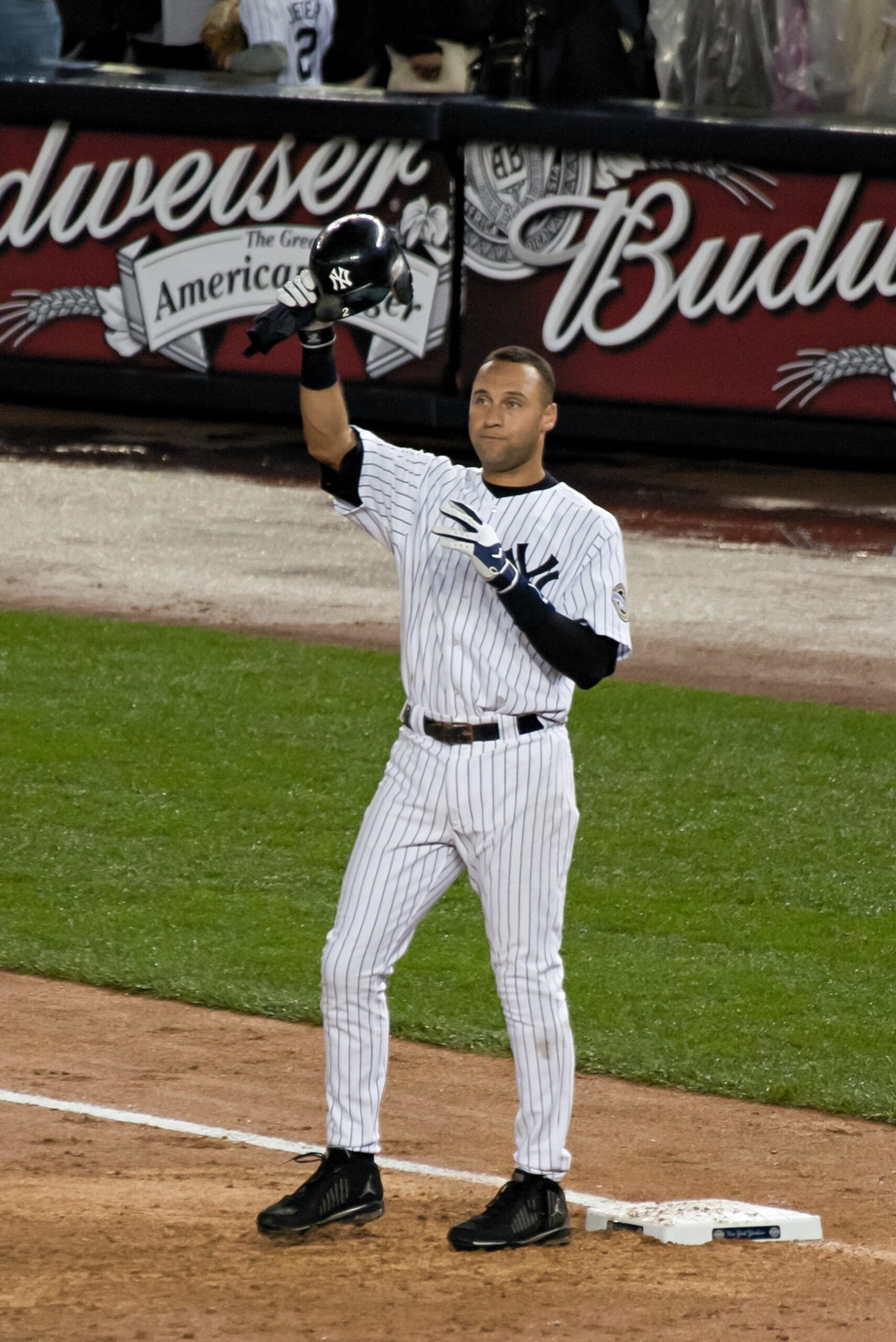 Derek Jeter saluting the crowd at Yankee Stadium in New York after recording his 2